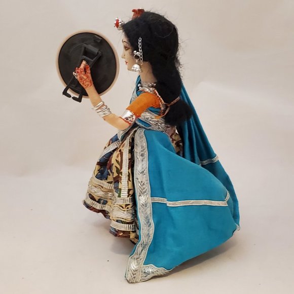 Traditional Rajasthan Woman Facing a Mirror on a Meadow - Picture 9 of 10